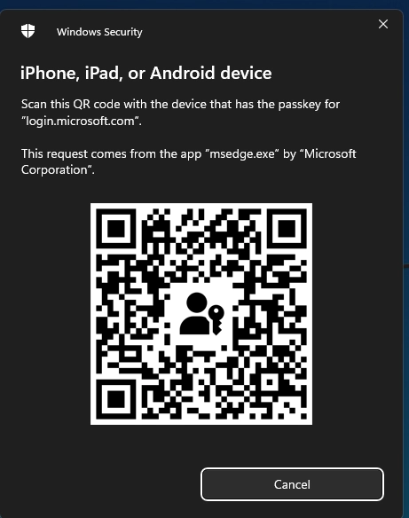 Windows Security screen displaying a QR code to set up a Microsoft passkey.