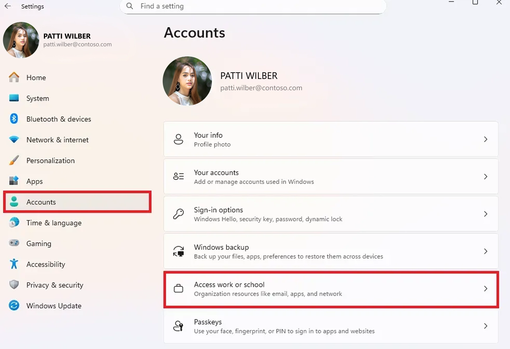 Windows Settings app displaying Accounts section with Access work or school option selected.